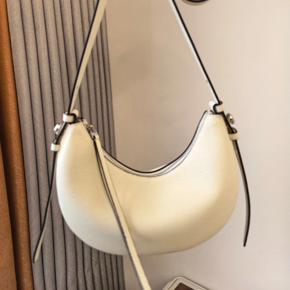 Tory Burch White Pebbled Crescent Shoulder Bag with Black Trim